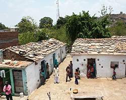 A group of people standing outside of a building